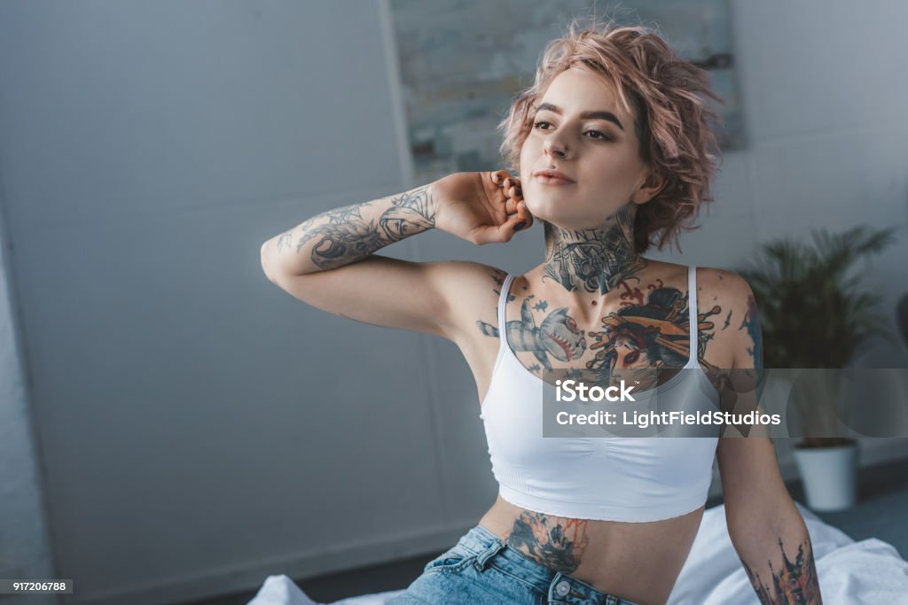 Beautiful Stylish Inked Girl Stretching In Bed At Morning Stock Photo Beautiful Stylish Inked Girl Stretching In Bed At Morning Stock Photo